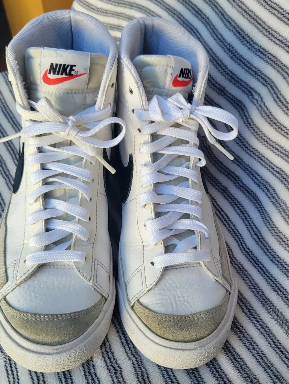 Nike White High-Top Blazers Sneakers with Black Swoosh and Red Tongue Tag